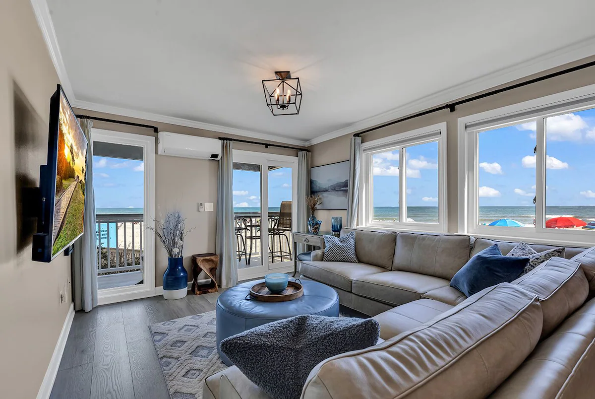 Living room with smart TV and ocean views